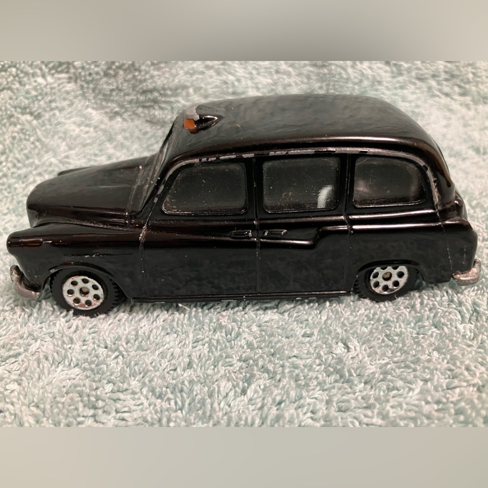 Vintage die-cast car toy London taxi cab Seerol, H.Seener ltd, Budgie Toys